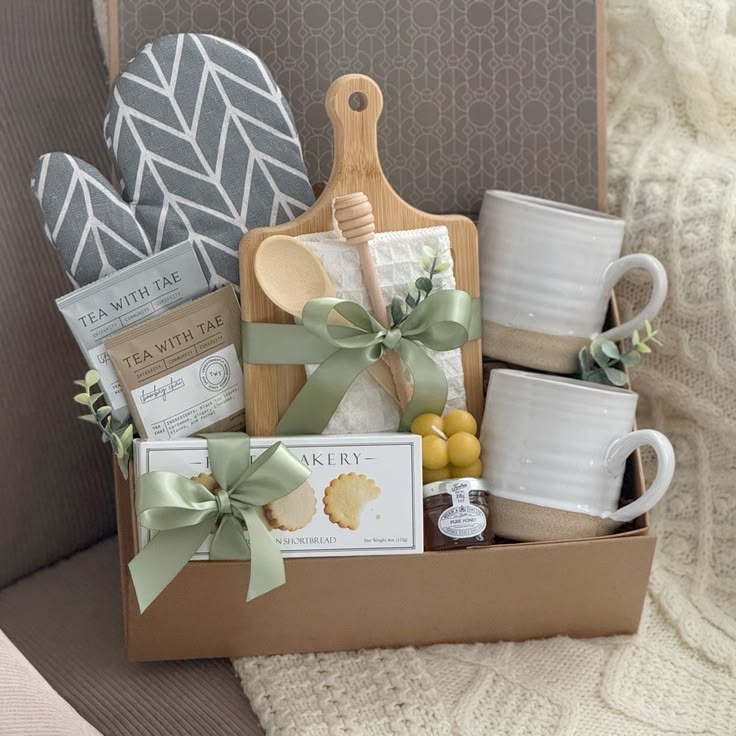 Tea and home hamper with mugs, biscuits and accessories